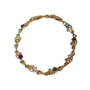 Feminine sparkling bracelet features multi links and rhinestones